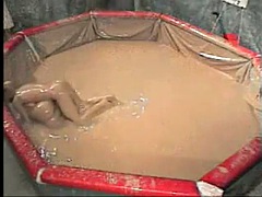 Naked mud wrestling