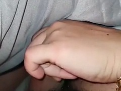 Stepmom shakes her stepsons cock under the blanket