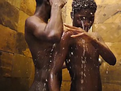 Slim African sucks cock in the shower before bareback sex
