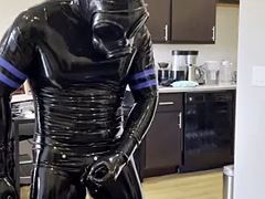 Rubberdrone jerks off in latex socks