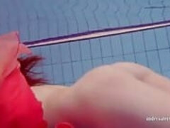 Hot Polish redhead swimming in the pool