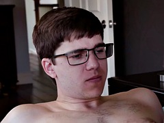 Nerdy jock jerks off to cum while being raised by an inked cocksucker