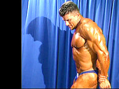 Bodybuilders flexing ripped muscles.and jerking lubed rod spraying cum