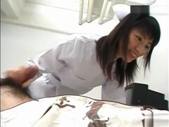Sexy nurse Saki Budou gives a quick handjob to her male patient