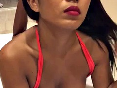 Sexy Thai whore oiled up her soles, ass and boobs in pose