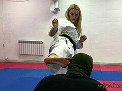 karate blond chic kneeing balls