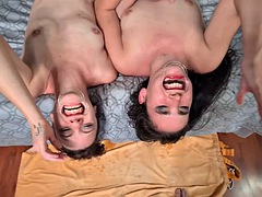 Two girls swallow my piss through lip dilators lying upside down