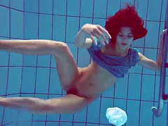 Sexy tight teen Marusya swims naked underwater