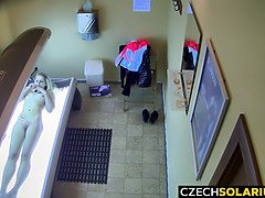 Blonde Girl Caught in Public Solarium