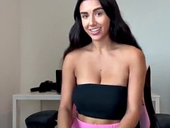 Busty brunette masturbates on webcam