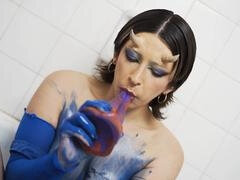 Steamy brunette gets herself off while having fun in the bathroom