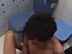 Latino twink fucks a kinky stud in the ass in the bathroom
