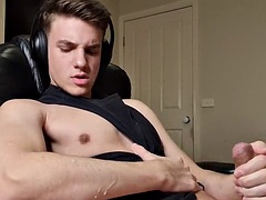 Cute twink sucks his own uncut cock