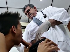 Skinny passive Asian twink fucked bareback by a mature doctor