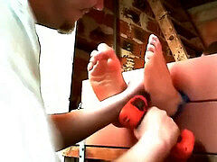 youthfull male feet mercilessly tickled