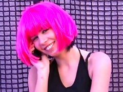 Neon pink-haired beauty rubs her wet cunt