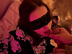 Christmas New Year blowjob from a beautiful woman in a mask