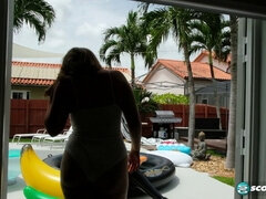 Britt James plays with her big tits by the pool in her bikini and scores some big boob play!