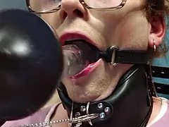 Femboy face fucked by a machine