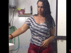 Watch this hot south Indian babe strip down to her tight red pants in the shower