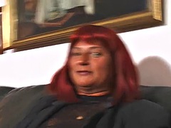 Red-haired mom nibbles cameraman at porn casting