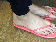 Angela sumptuous Toes red-Tips In FlipFlops