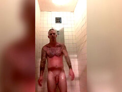 Prisoner showers after haircut