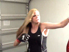 Cassidy's new Gloves - platinum-blonde Fighter kicking Man-Slave