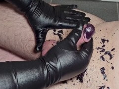 BDSM action featuring candle wax and prostate massage on a hard cock