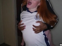 Busty Redhead Football Fan Takes BBC Anal in Public Hallway After Losing Bet