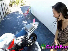 Pretty chinese teen inserts Dildo On Motorbike For Money
