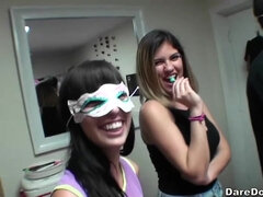 Teen chicks in masks are being hotly fucked in doggy pose at dorm