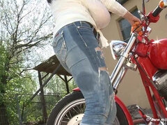 Bike washing - Brunette mature biker with monster jugs teasing topless outdoors