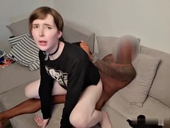 Anal fucking by a black cock on a sofa for a trans twink