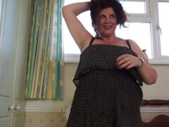 Busty British housewife Gilly pleasuring herself with fingers