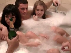 A sexy group sex is pursuing in the tub of warm and soapy water here
