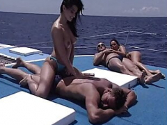 An erotic-laden softcore clip with good-looking hot and plus seductive kittens in their bikinis during a voyage on a luxury boat
