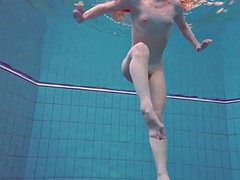 The pretty young Polish girl Alice swimming without clothes