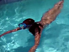 Hot brunette slut Candy swims underwater