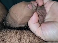 Stepmom playing with her stepsons cock while watching a hot porn video