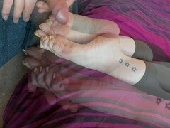 Wrinkled soles, eyes covered, foot slave