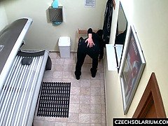 Luxury Busty brunette masturbates in solarium