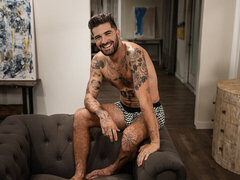 Inked DILF grants twink the best facial in mind-blowing XXX