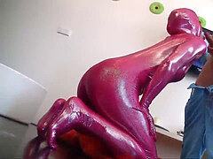Catsuit doll pummeling