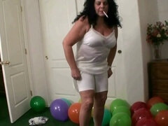 Two mature grandmothers indulge in a thrilling balloon-busting fetish together