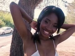 Spicy black girl Boni Brown sucks a hard cock on the street