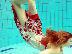 steaming polish red-haired swimming in the pool