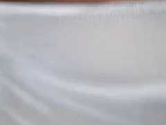 Granny showing her huge tits and hairy pussy