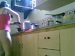LATINA MATURE NUDE KITCHEN