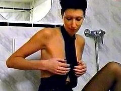 Slim lady from Germany masturbates before going in the shower